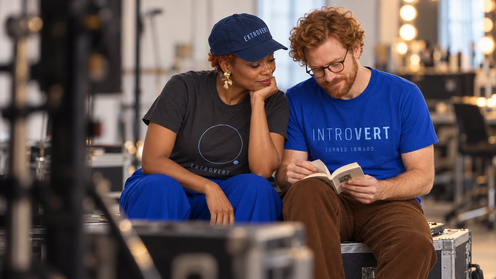An extrovert and an introvert sharing a book