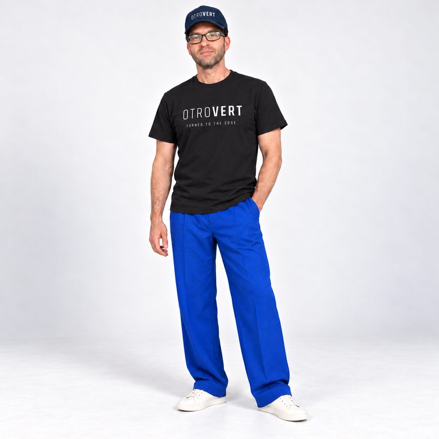 Limore full length in the black OTROVERT tee and navy cap