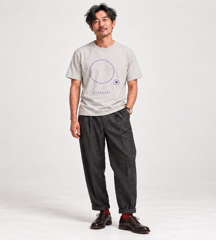 A man in the ring and dot tee